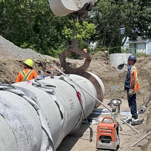 Pose d'une conduite en béton armé